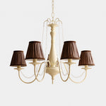 Bild in Gallery-Viewer laden, Front view of French five-light chandelier with brown fabric shades and crystal bead swags
