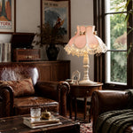 Load image into Gallery viewer, Pink lace table lamp beside a leather chair