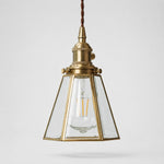 Load image into Gallery viewer, Clear glass pendant light with brass canopy