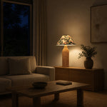 Bild in Gallery-Viewer laden, Rattan table lamp casting warm evening light