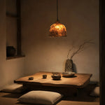 Bild in Gallery-Viewer laden, Warm paper pendant light installed above a low table setting