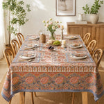 Cargar imagen en el visor de la Galería, Charcoal paisley floral tablecloth styled in a warm dining room