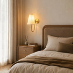 Bild in Gallery-Viewer laden, French brass fabric wall sconce installed beside a bed