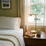 Load image into Gallery viewer, Modern Gold Frame Desk Lamp – Suspended Globe Light for Bedside and Home Office