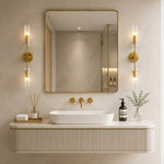Cargar imagen en el visor de la Galería, Copper two-head alabaster wall sconces warming a modern vanity