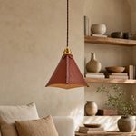 Load image into Gallery viewer, Leather pendant light beside layered shelving in a cozy room