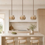 Cargar imagen en el visor de la Galería, Three light travertine pendant above a bright kitchen island