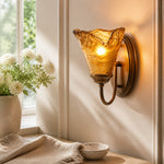 Bild in Gallery-Viewer laden, Sculpted Amber Glass and Brass Wall Sconce