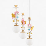 Bild in Gallery-Viewer laden, Three light pastel unicorn chandelier with floral accents