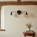 Cargar imagen en el visor de la Galería, Lámpara de tocador Pyralis Cone de 3 luces: diseño moderno y elegante para baños y pasillos