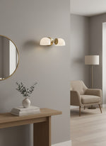 Load image into Gallery viewer, Double Globe Sconce – Horizontal Wall Light In Polished Brass Finish