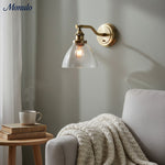 Load image into Gallery viewer, Driscoll Minimalist Clear Glass & Brass Wall Sconce – Adjustable Modern Wall Light for Bedroom or Hallway