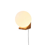 Load image into Gallery viewer, Evelyn Wood Orb Plug-In Wall Light - product image 4