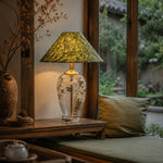 Bild in Gallery-Viewer laden, Floral glass table lamp in a calm lounge corner