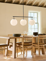 Bild in Gallery-Viewer laden, Ulvara Glas-Kugel Linear Cluster Deckenlampe – Zeitgenössischer Stil für Wohnraum & Kücheninsel