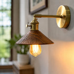 Load image into Gallery viewer, Hand-carved wall sconce in a bright contemporary interior