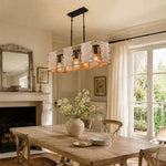 Cargar imagen en el visor de la Galería, Warm farmhouse pendant light above a dining table
