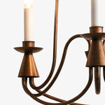 Load image into Gallery viewer, Close-up of antique bronze candle cup and curved iron arms