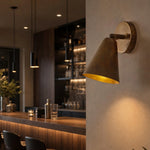 Cargar imagen en el visor de la Galería, Brass cone wall lamp in a bar interior