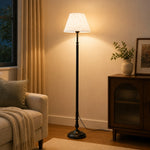 Charger l'image dans la visionneuse de galerie, Fabric shade floor lamp styled beside a living room sofa