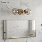 Cargar imagen en el visor de la Galería, Lámpara de tocador de baño moderna de estilo industrial Lumio Globe de cristal transparente