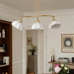 Bild in Gallery-Viewer laden, Three-light chandelier installed above a dining area