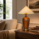 Bild in Gallery-Viewer laden, Off-white shade wood table lamp beside a sofa