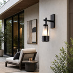 Charger l'image dans la visionneuse de galerie, Vintage black outdoor wall lantern in a covered exterior setting 2