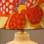 Bild in Gallery-Viewer laden, Close-up of the floral shade and ceramic lamp neck