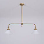 Cargar imagen en el visor de la Galería, Lámpara colgante Lumos de barra de latón con dos cabezales: iluminación arquitectónica moderna para isla de cocina