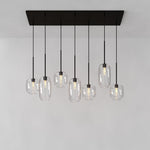 Bild in Gallery-Viewer laden, Lumivelle Skulpturaler 7-flammiger Kronleuchter – Höhenverstellbare Moderne Glas-Pendelleuchte