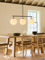 Bild in Gallery-Viewer laden, Ulvara Glas-Kugel Linear Cluster Deckenlampe – Zeitgenössischer Stil für Wohnraum & Kücheninsel