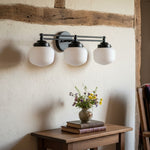 Bild in Gallery-Viewer laden, Opalume Metal Canopy Globe Vanity Sconce — Übergangs-Art-Deco-Wandleuchte