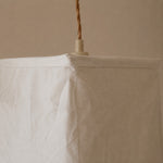 Load image into Gallery viewer, Close view of the cord and upper shade seam