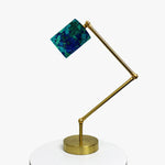 Load image into Gallery viewer, Adjustable brass-tone table lamp with blue green floral fabric shade
