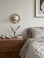 Load image into Gallery viewer, Oria Minimalist Travertine Wall Sconce - Sculptural Ambient Light for Bedroom