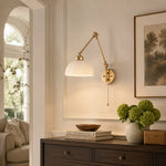 Load image into Gallery viewer, Swing arm wall lamp above a console