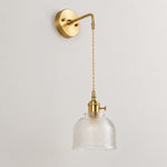 Bild in Gallery-Viewer laden, Clear glass wall light with brass arm, CW shade 11 cm high and 14 cm diameter