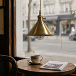 Cargar imagen en el visor de la Galería, Conical copper pendant light in a cafe interior