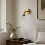 Cargar imagen en el visor de la Galería, Clear glass wall lamp installed beside a bed