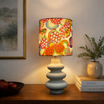 Bild in Gallery-Viewer laden, Sculptural ceramic table lamp in a warm room setting