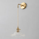 Bild in Gallery-Viewer laden, Clear glass wall light with brass arm, LW shade 19 cm diameter