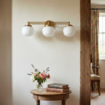 Bild in Gallery-Viewer laden, Opalume Metal Canopy Globe Vanity Sconce — Übergangs-Art-Deco-Wandleuchte