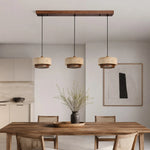 Cargar imagen en el visor de la Galería, three head travertine pendant light over a dining table