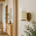 Load image into Gallery viewer, Cream wall sconce in hallway