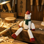 Cargar imagen en el visor de la Galería, Hand-carved wooden gray snowman ornament styled on a tabletop edge