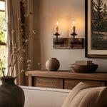 Cargar imagen en el visor de la Galería, Two light rustic candle wall sconce glowing above a wooden console