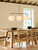 Bild in Gallery-Viewer laden, Ulvara Glas-Kugel Linear Cluster Deckenlampe – Zeitgenössischer Stil für Wohnraum & Kücheninsel