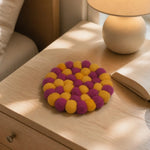 Cargar imagen en el visor de la Galería, Colorful felt coaster on a bedside table