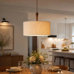 Cargar imagen en el visor de la Galería, Natural linen drum pendant lamp above a dining table